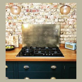 small brass splashback mottled finish kitchen