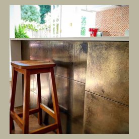 Brooke, tiled brass heavy aged island kitchen