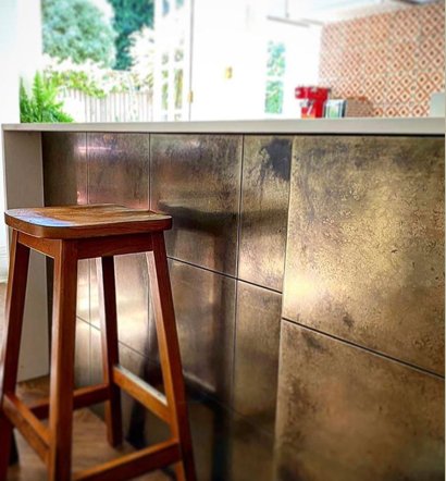 Brooke, tiled brass heavy aged island kitchen