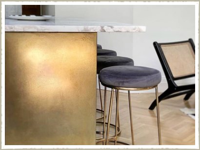 Gently aged brass kitchen island