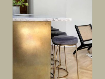 Gently aged brass kitchen island