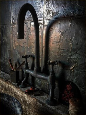 aged cast bronze