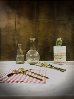 Square brass tile effect splashback